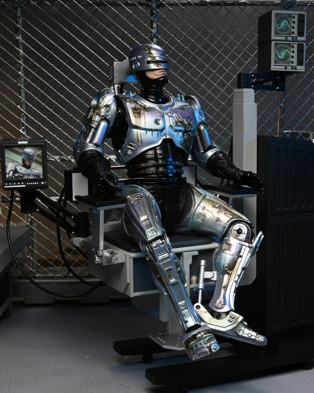 Neca Figura Robocop con Silla Mecanica OCP Crime Prevention unit