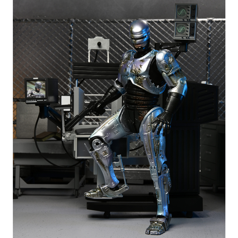 Robocop Chair Neca Figura Robocop con Silla Mecanica OCP Crime Prevention unit – Boom ...